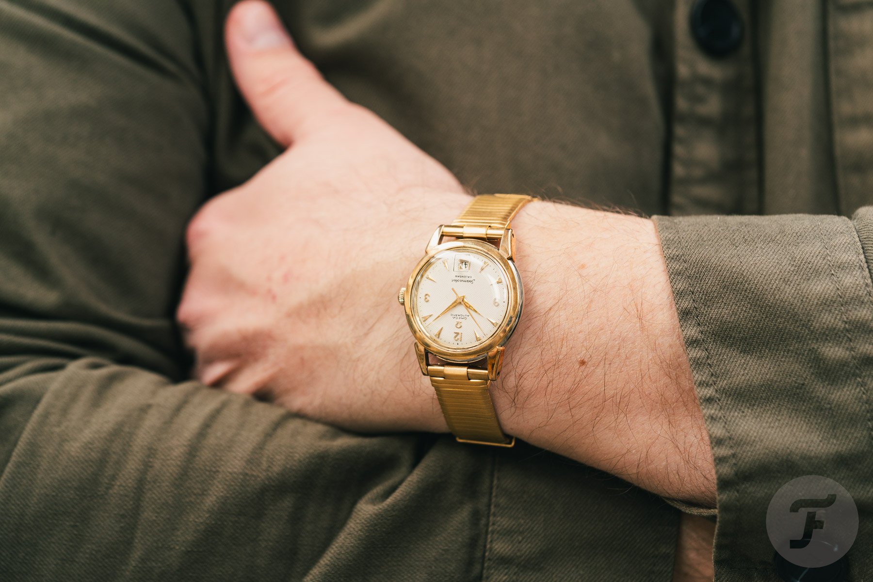 1950s Omega Seamaster and Gold Plated Fourstoner Comfit Military Type Wrist Bracelet, Crossed Arms