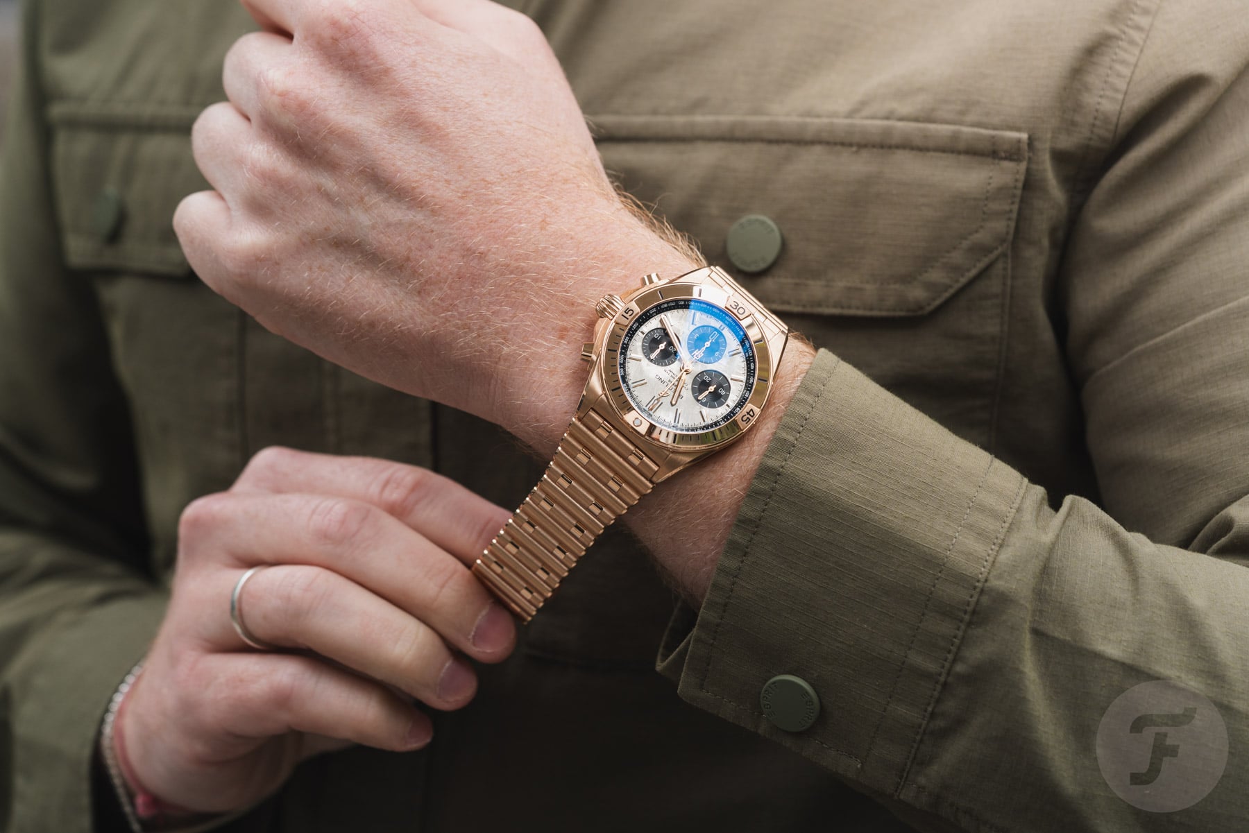 putting Breitling Chronomat B01 42 Erling Haaland on wrist