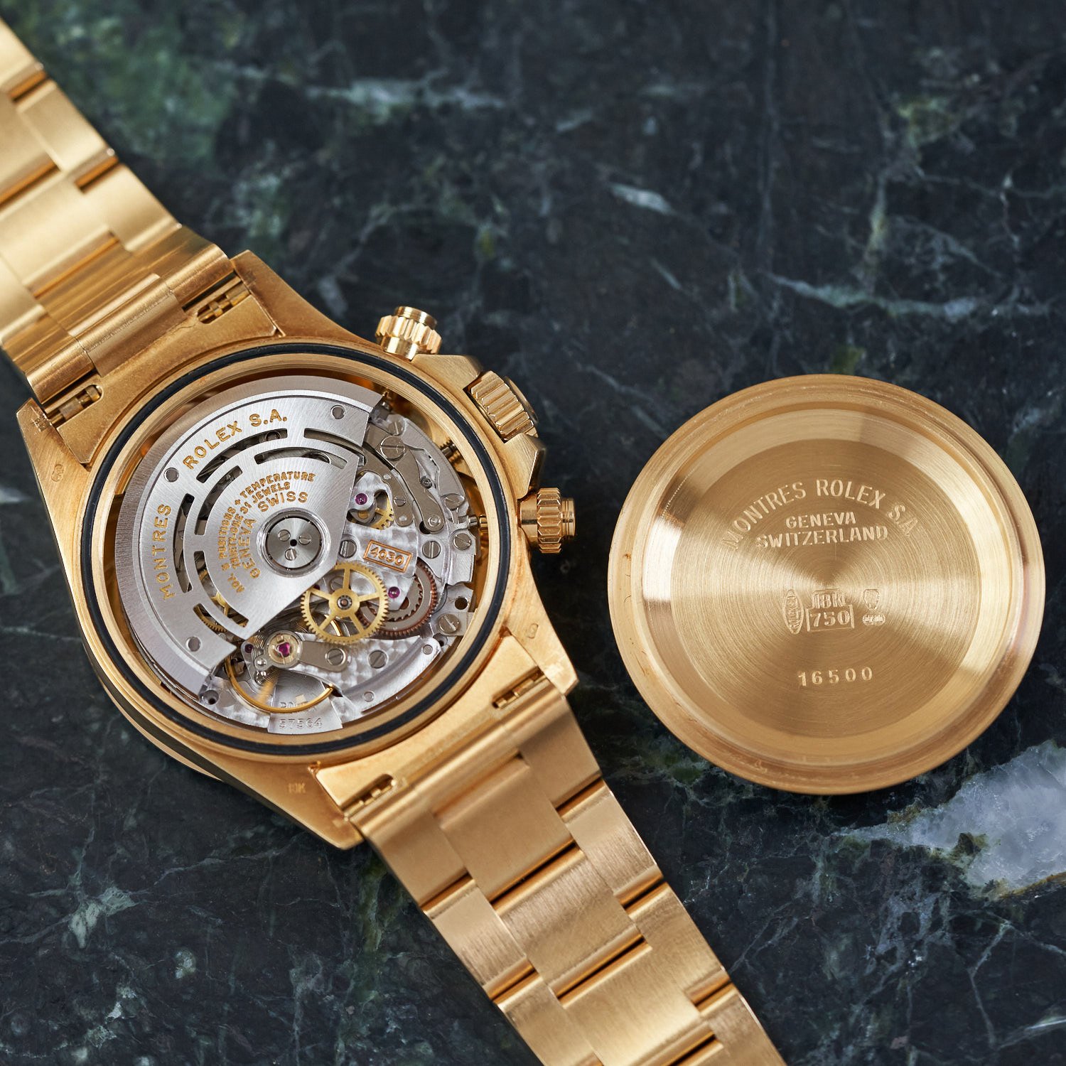 Rolex Daytona 16258 face down on green marble with case back removed