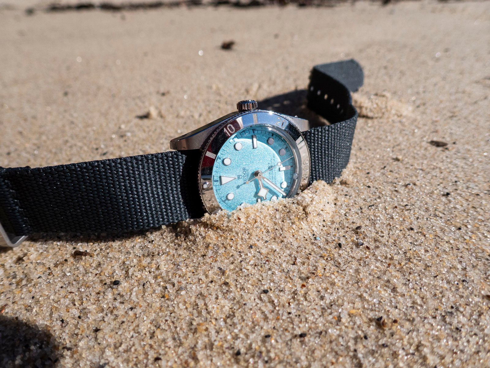 Tudor Black Bay 54 "Lagoon Blue" In the sand on the beach