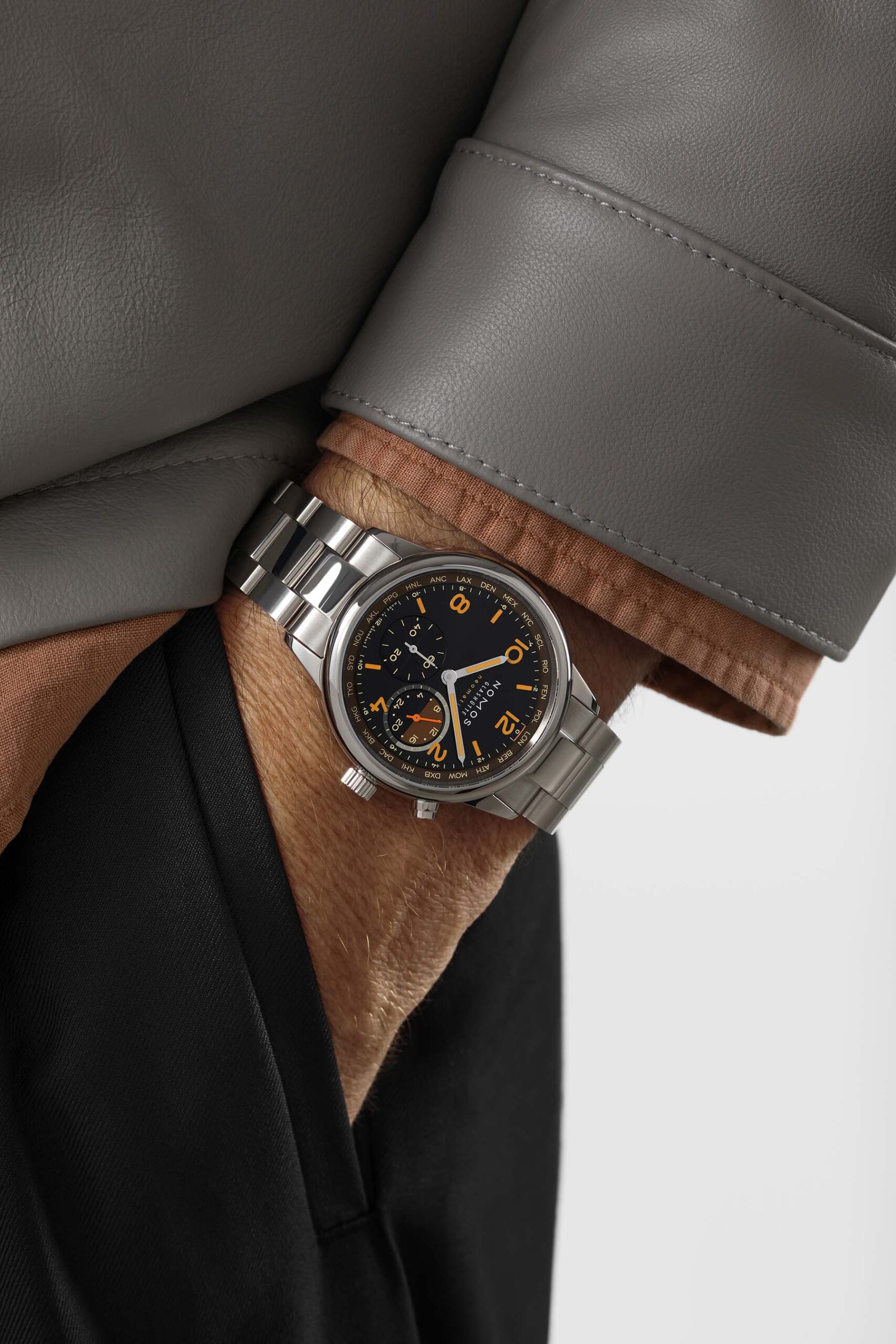 Nomos Club Sport Neomatik Worldtimer Night Navigation Grid pocket shot