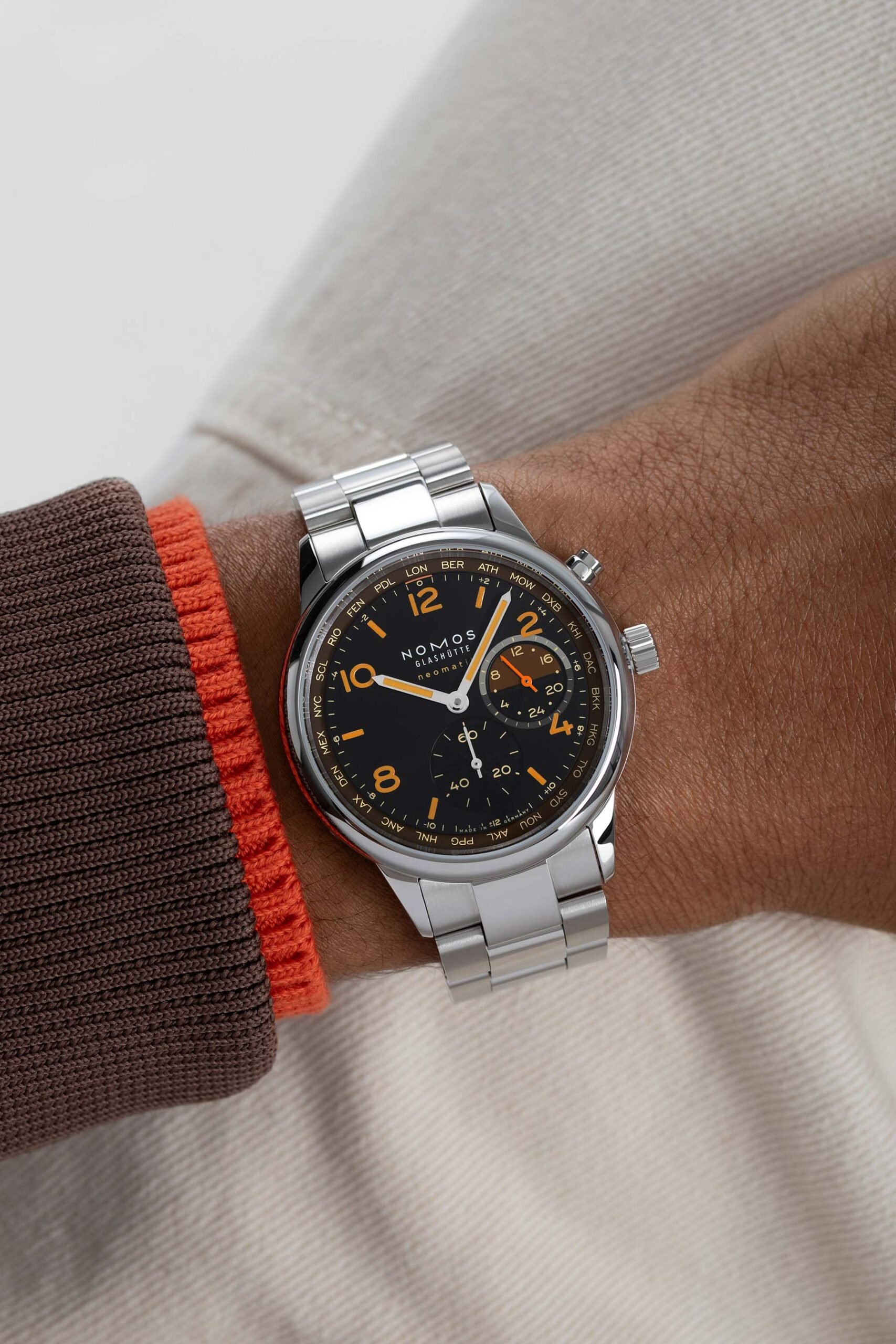 Nomos Club Sport Neomatik Worldtimer Night Navigation Grid wrist shot