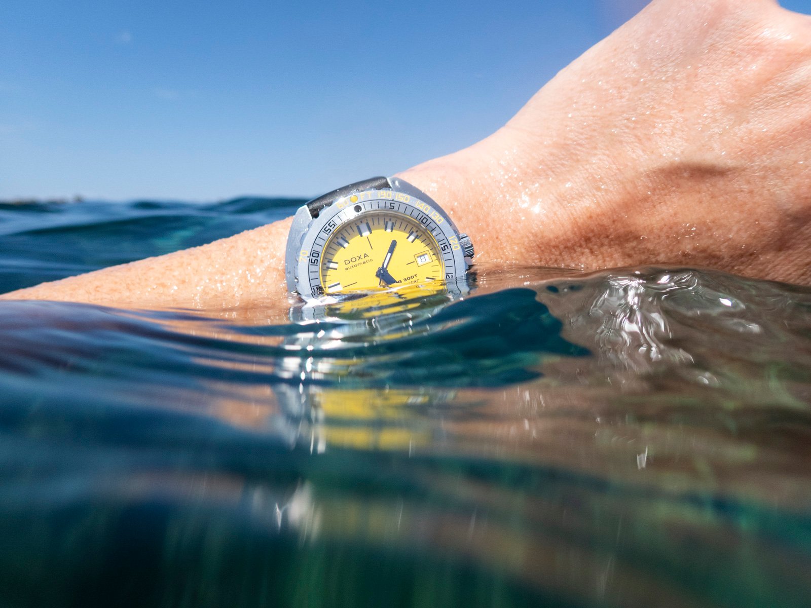 Doxa Sub 300T Divingstar wrist shot in water
