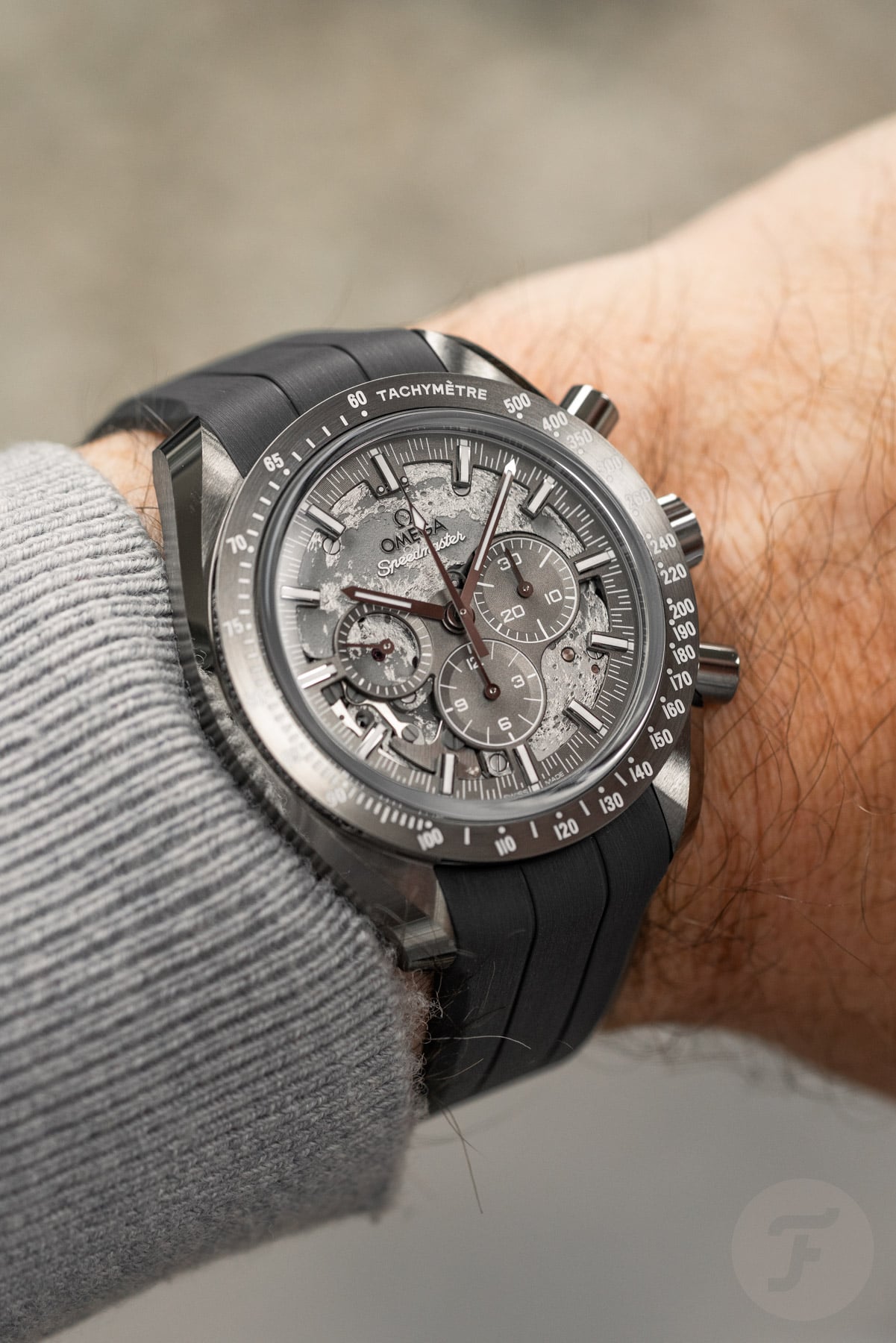 Omega Speedmaster Grey Side of the Moon with rubber strap, wrist shot