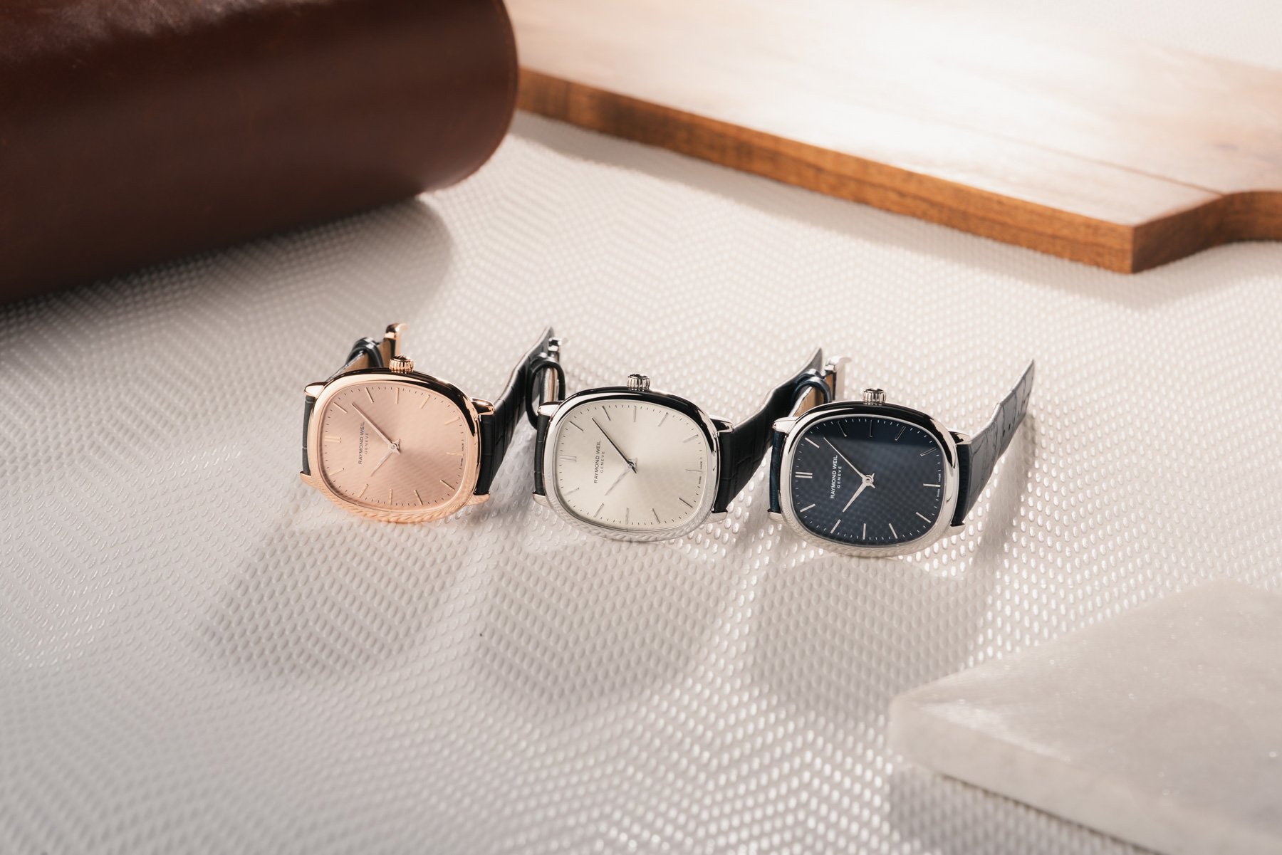 mechanical Raymond Weil Toccata Heritage models on side, crowns up