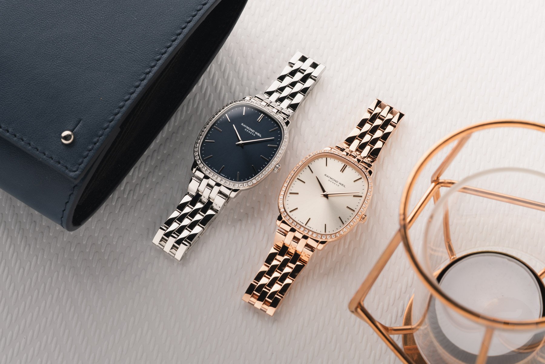 Raymond Weil Toccata Heritage models with bracelets side by side, flat-lay