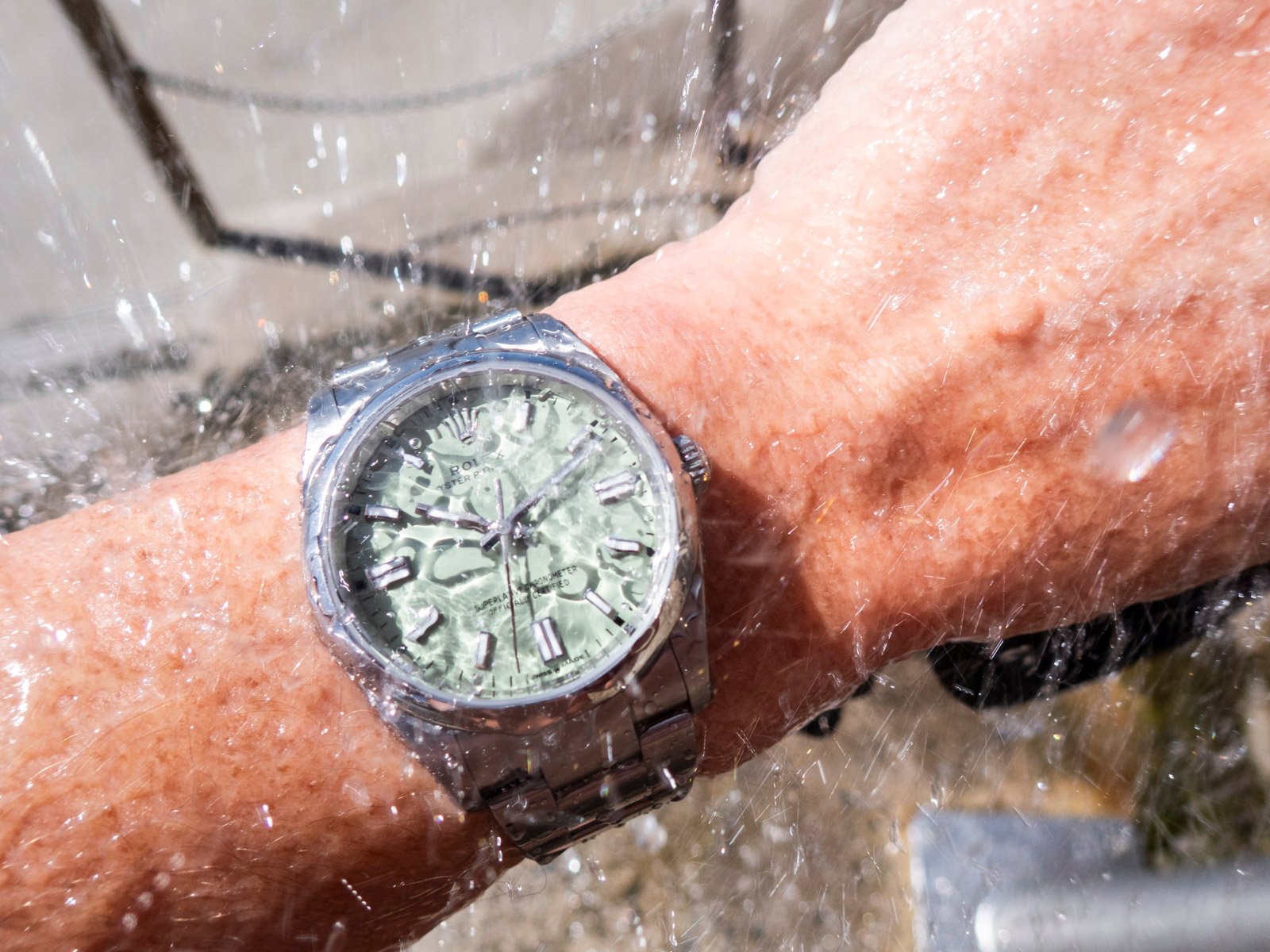 Rolex Oyster Perpetual 36 "Pistachio" on wrist under shower