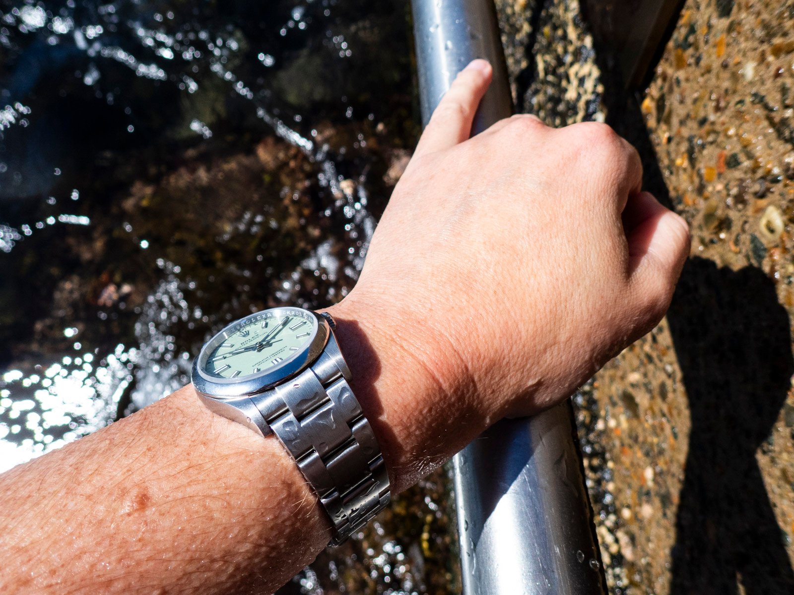 Rolex Oyster Perpetual 36 on wrist, lifestyle shot
