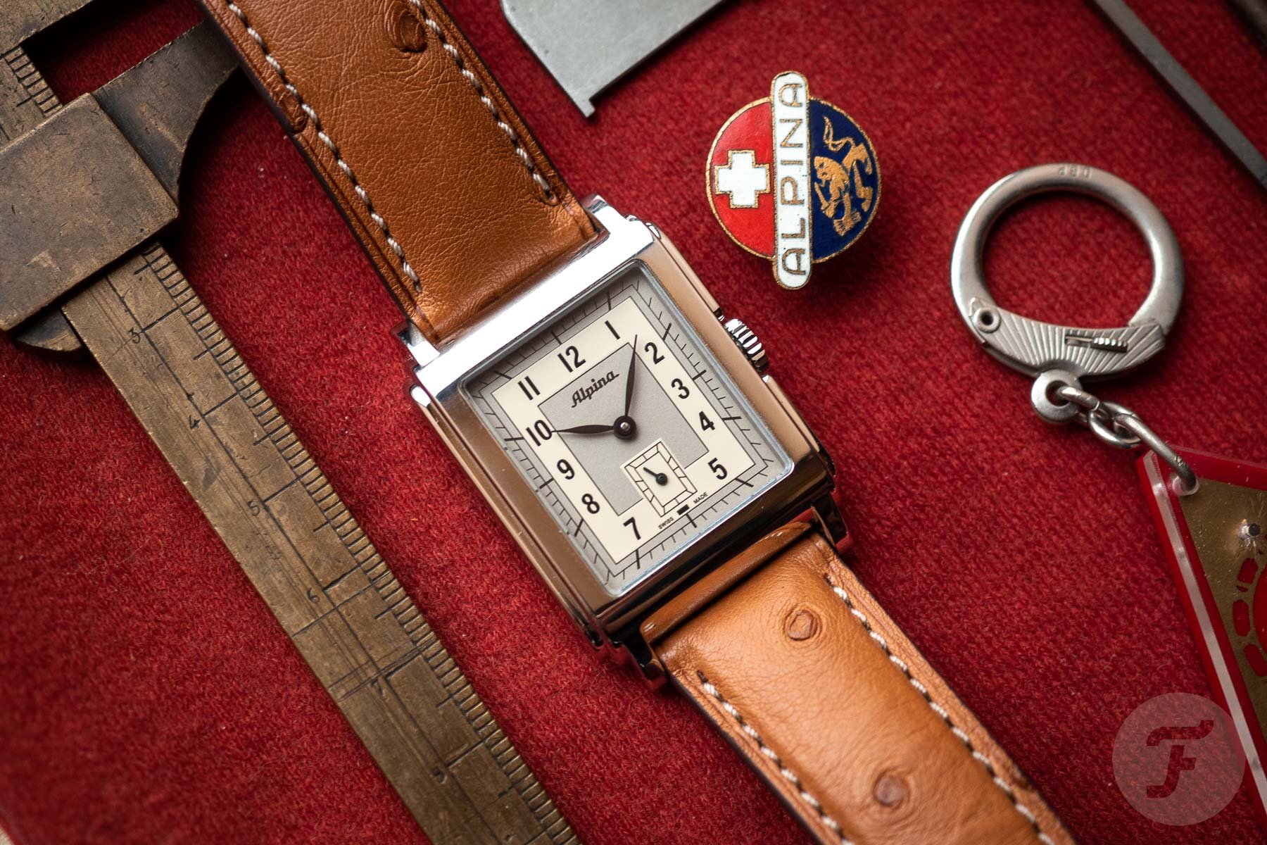 Flat lay of the Alipna Alpiner Heritage Carrée with a movement from 1938