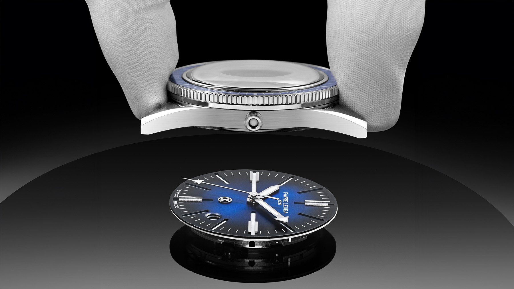 holding case above the Favre Leuba Deep Raider Renaissance blue dial and movement