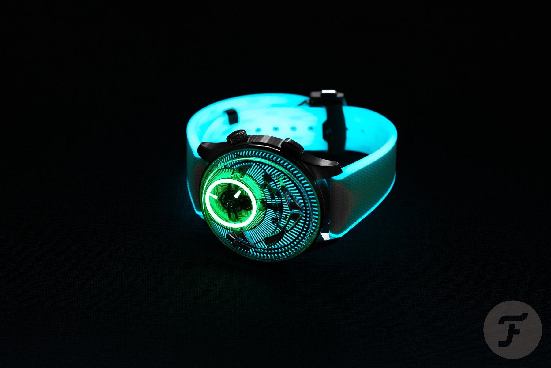 Christopher Ward C1 Bel Canto Lumière on side, crown up, lume shot,