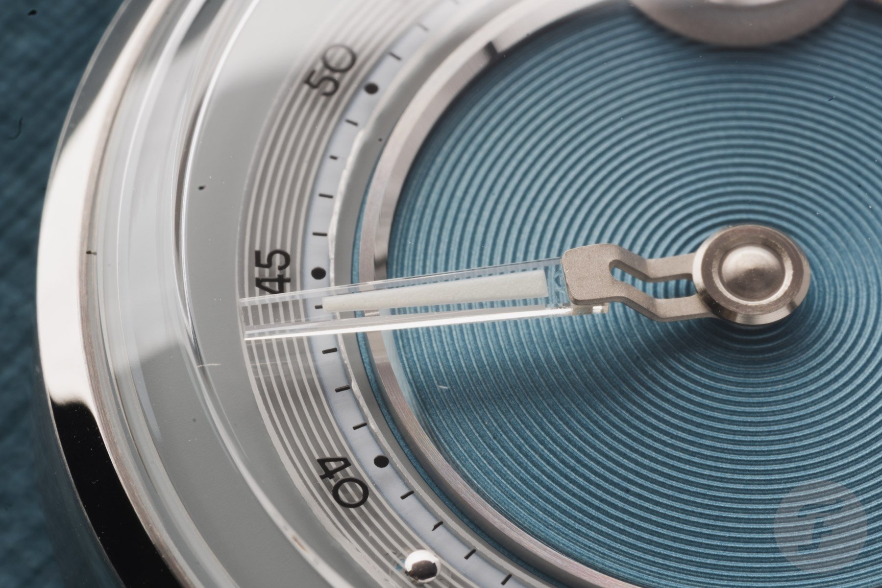 Christopher Ward C1 Jump Hour Mk V dial and hand, macro shot