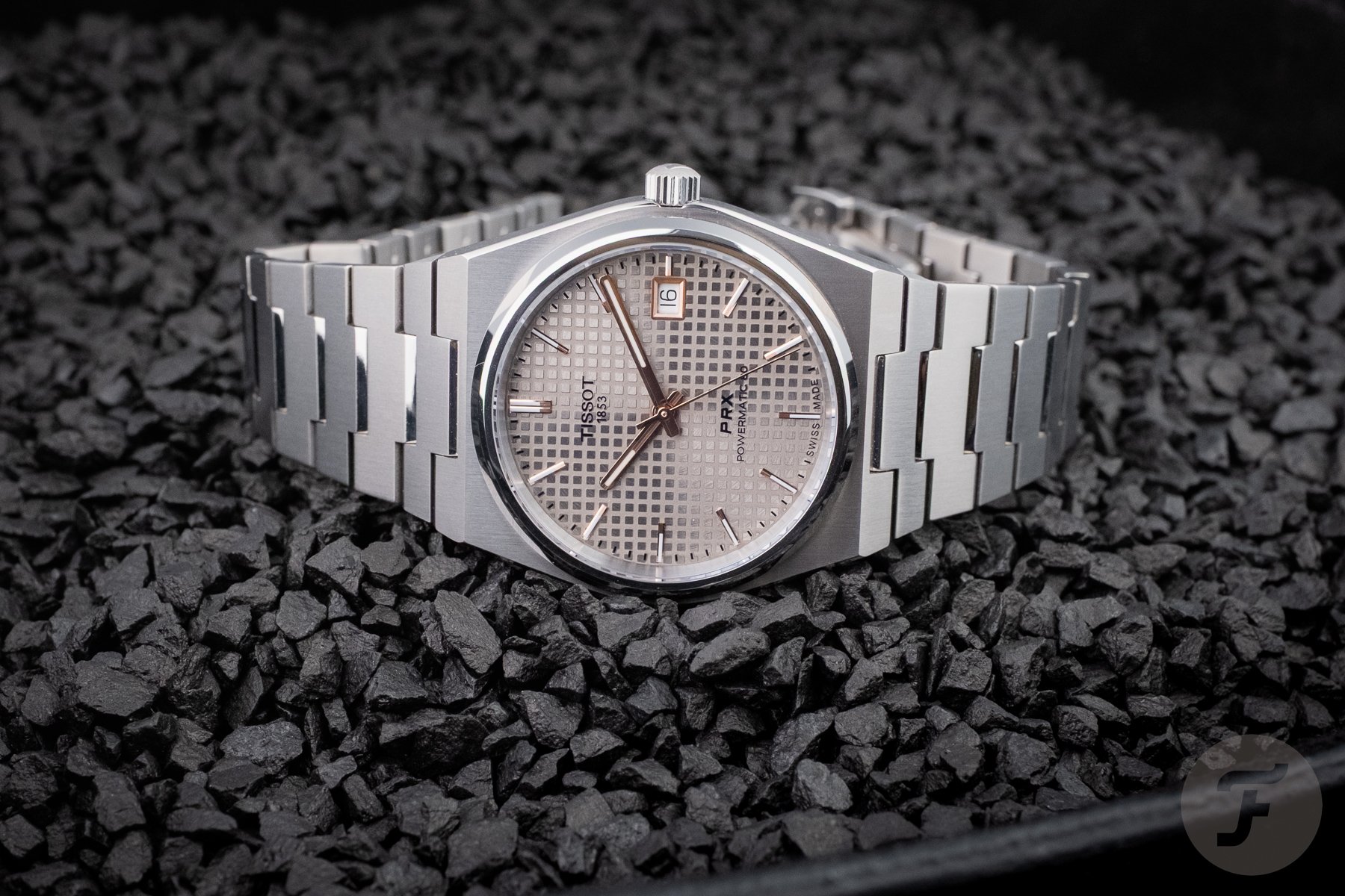 Tissot PRX Titanium 38mm on side, crown up