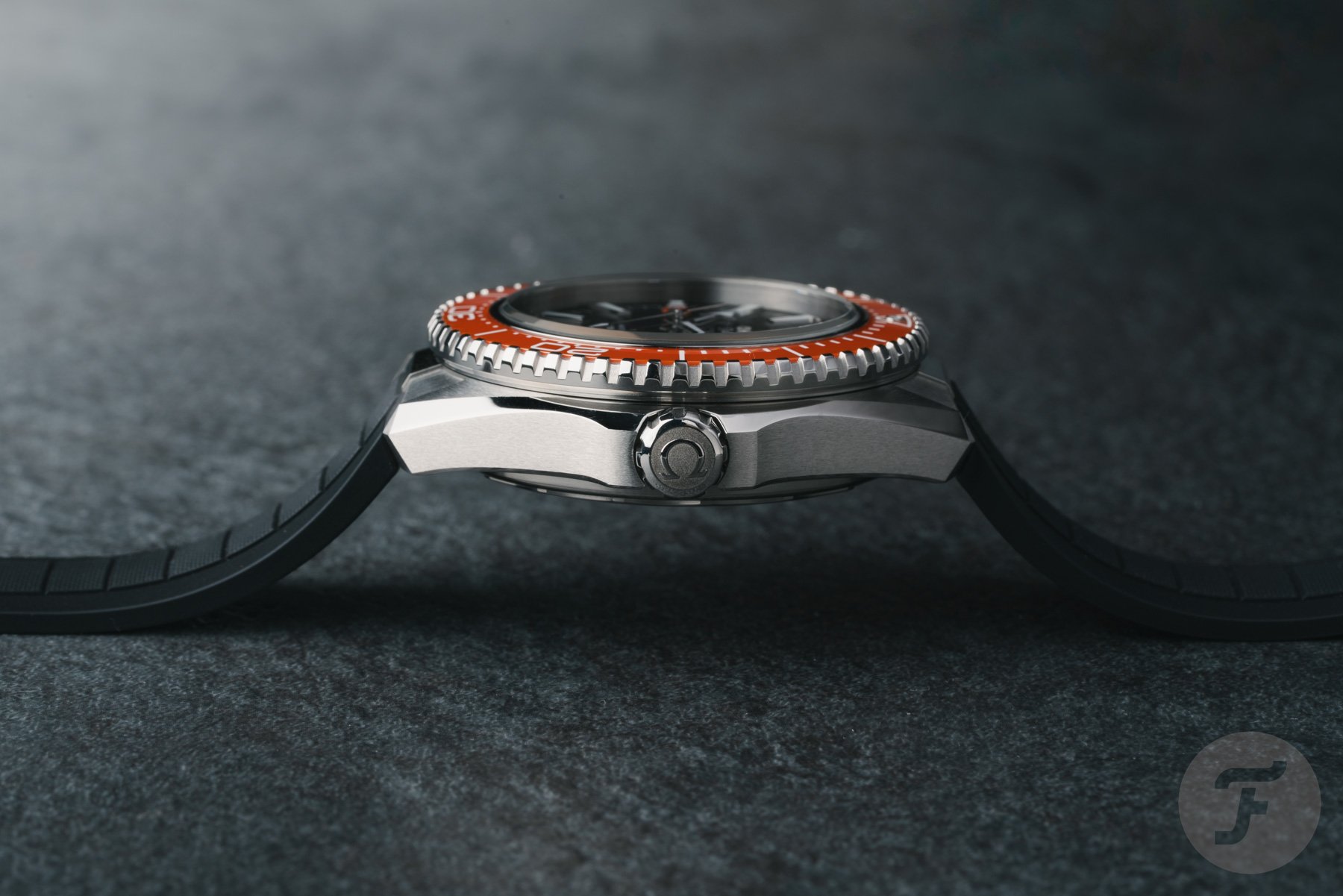 Orange Omega Seamaster Planet Ocean side view