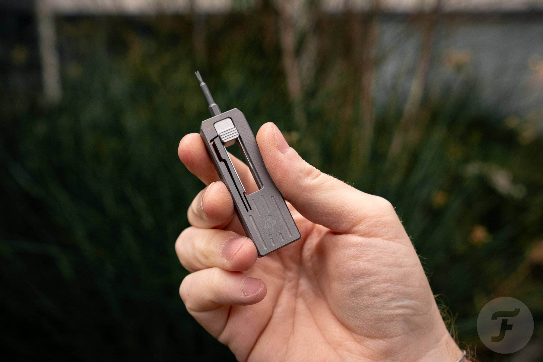 Slidecatch Grey Titanium EDC Tool 2 in the hand 2