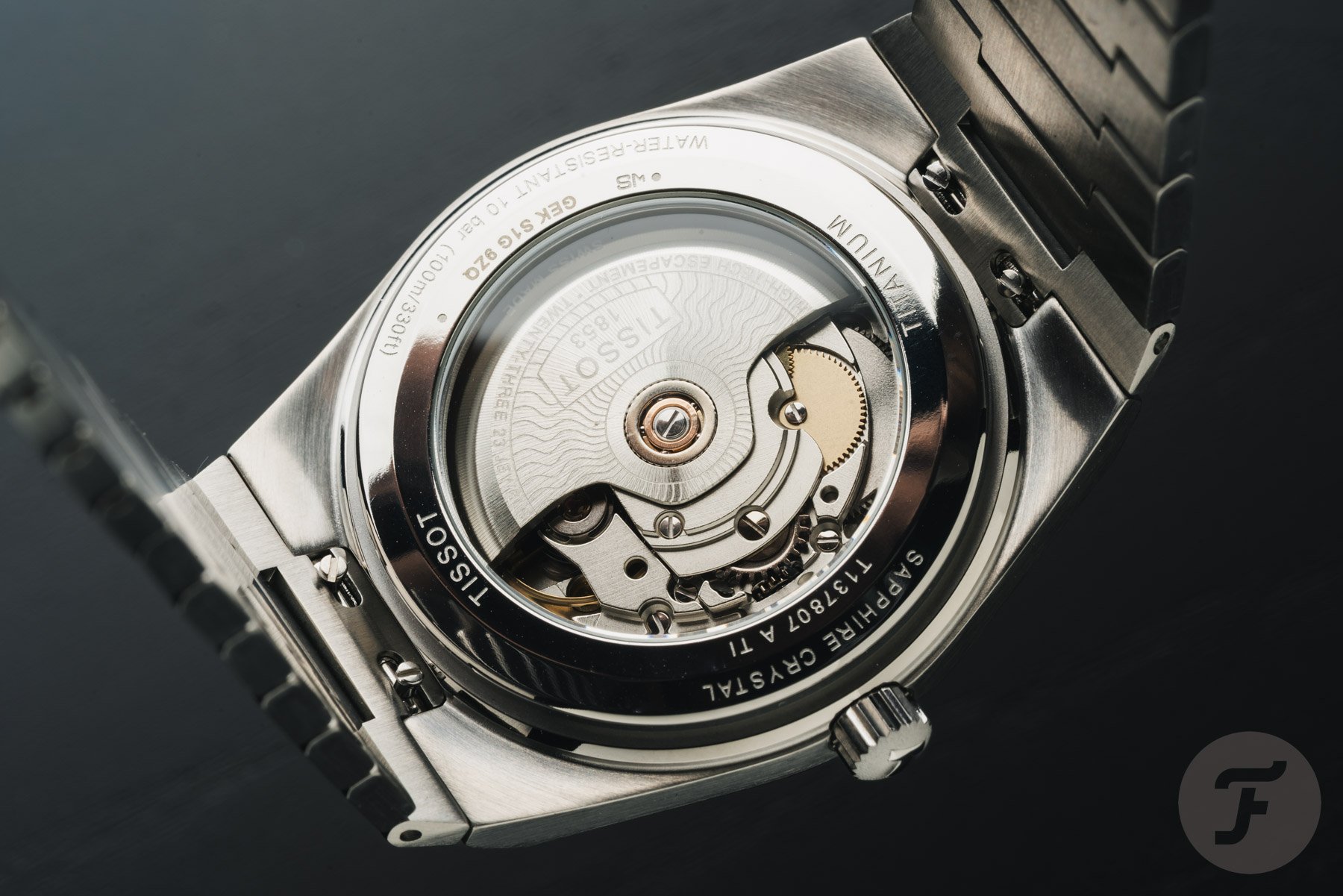 Tissot PRX Titanium 38mm case back and movement