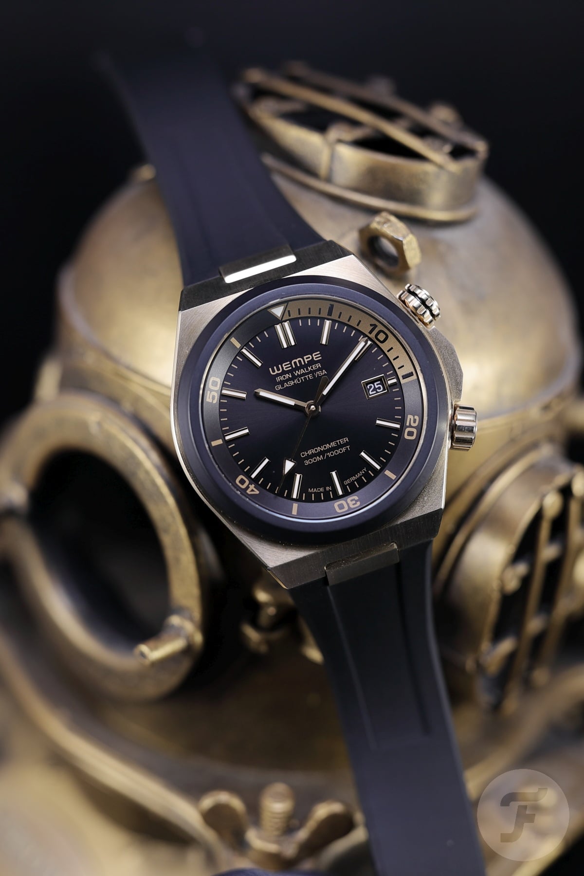 Wempe Iron Walker Diver Bronze on miniature bronze dive helmet