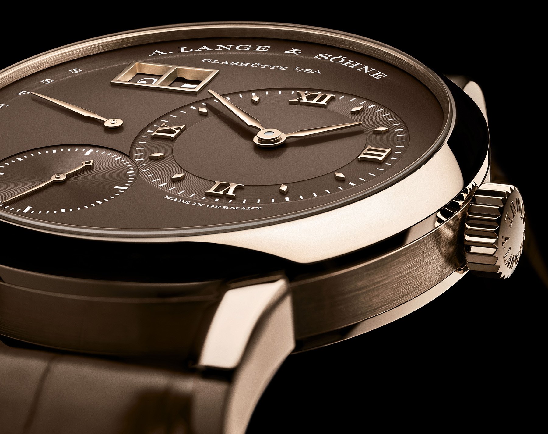 A. Lange & Söhne Lange 1 Daymatic Honeygold dial and case side, slanted view