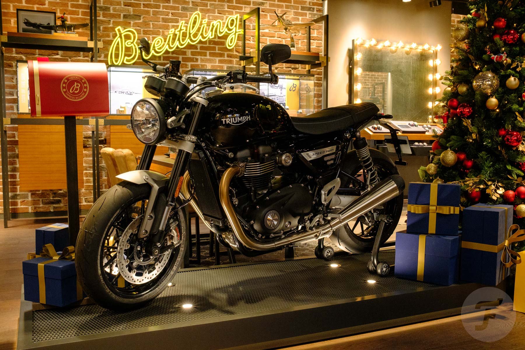 Triumph motorcycle at Breitling boutique in The Hague