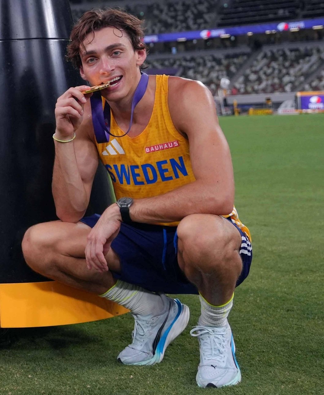 watches on the podium in 2025 — Armand "Mondo" Duplantis posing with a gold medal