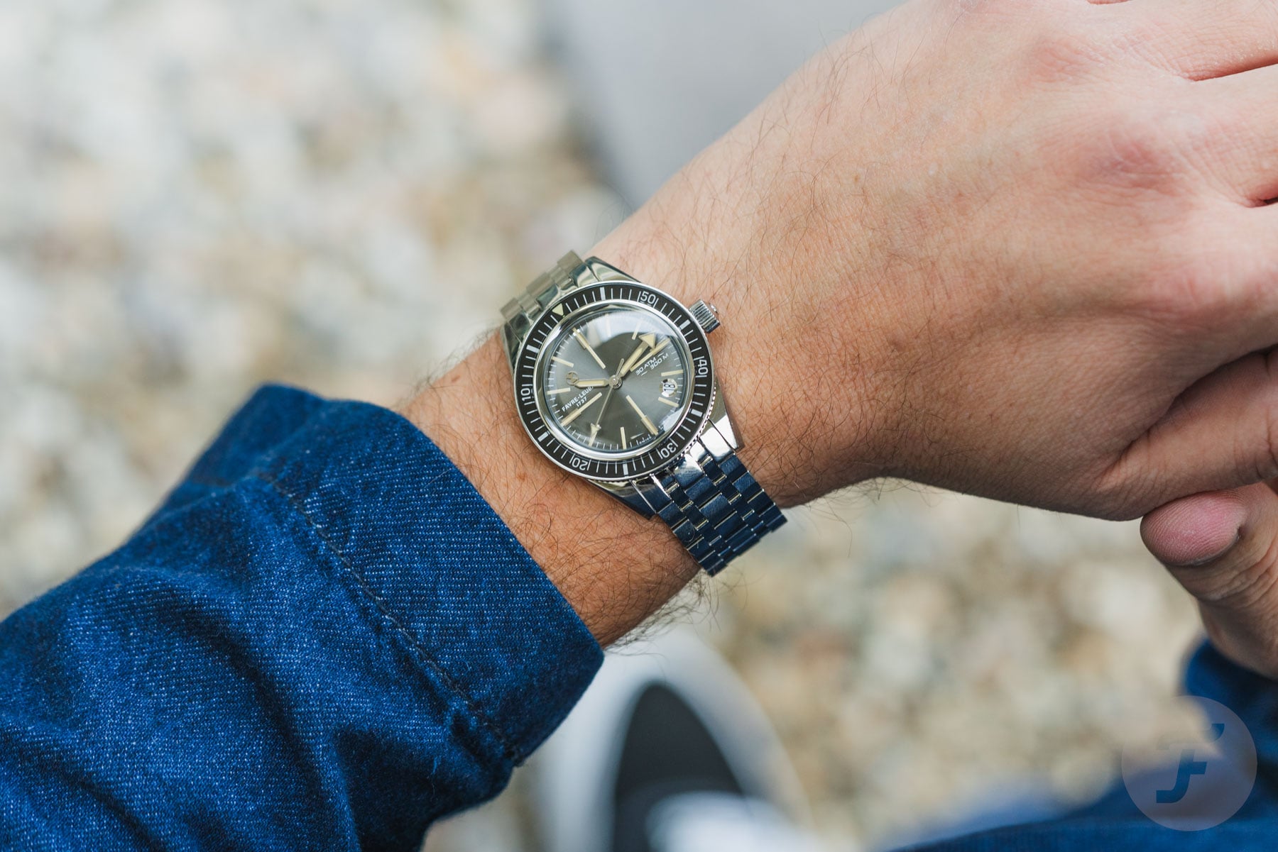 Favre Leuba Deep Raider Revival on wrist, over-shoulder shot