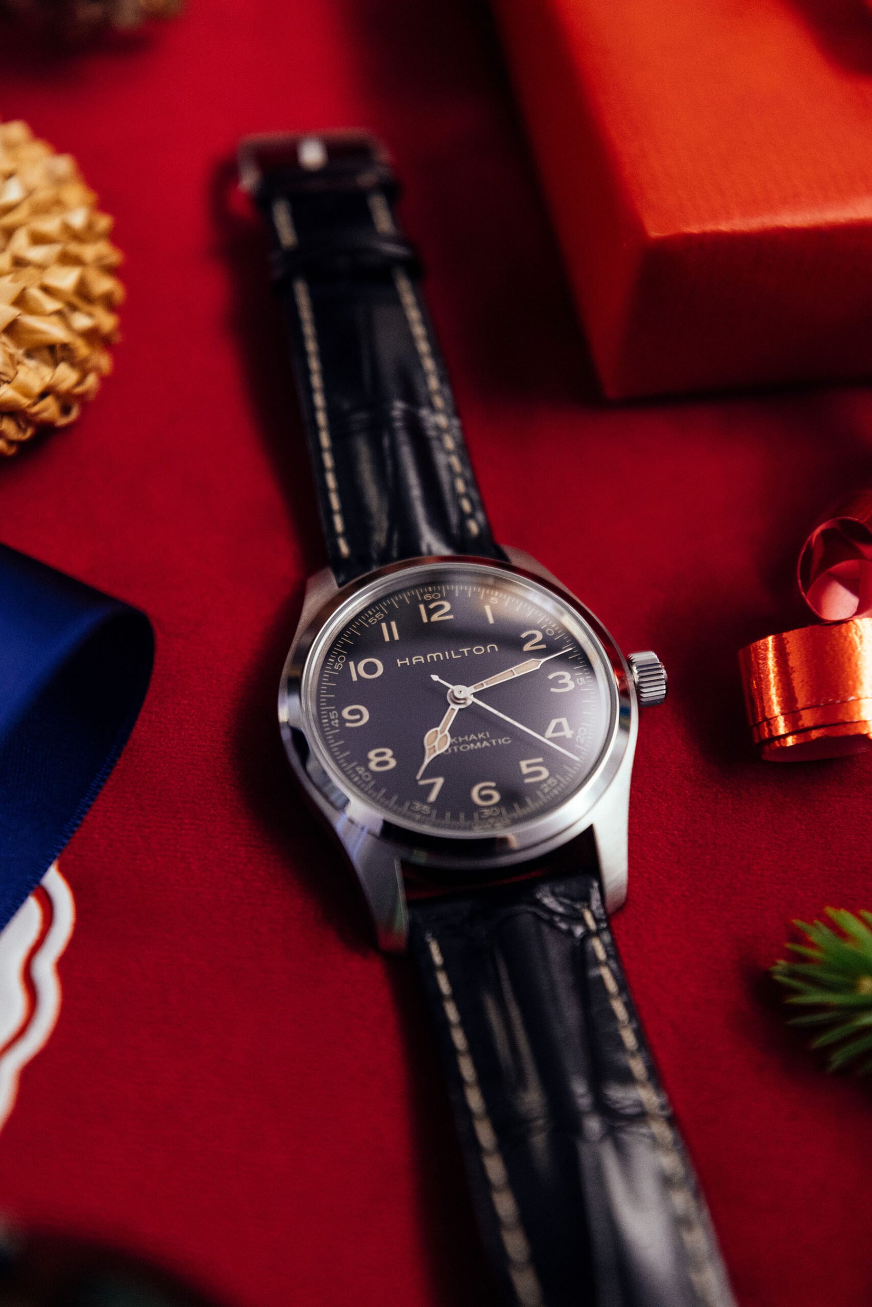 Hamilton Khaki Field Murph holiday flat-lay