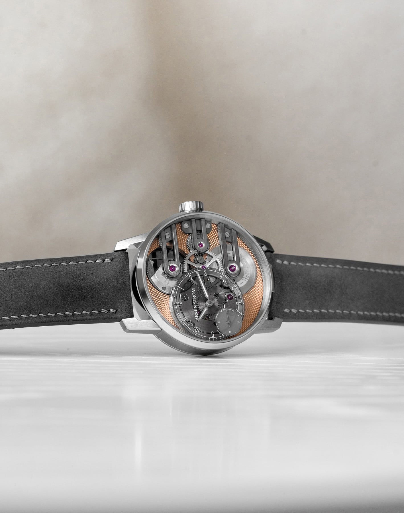 Armin Strom Gravity Equal Force Ultimate Sapphire Salmon on its side