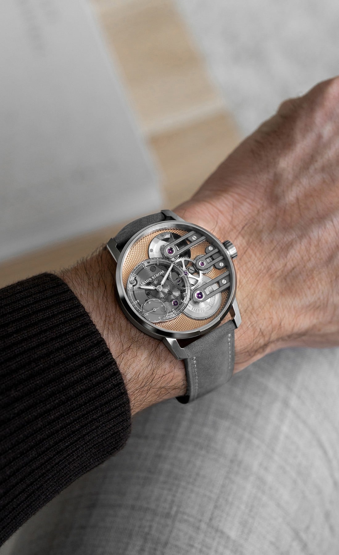 Armin Strom Gravity Equal Force Ultimate Sapphire Salmon on the wrist