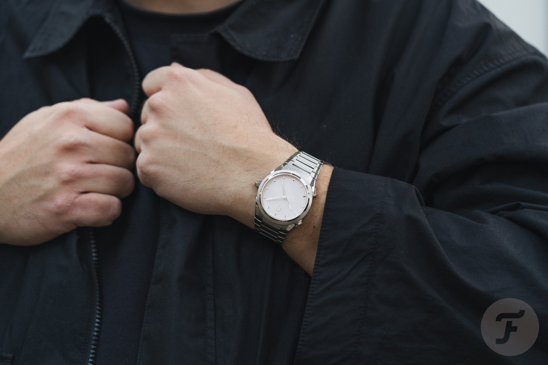 Parmigiani Fleurier Tonda PF Minute Rattrapante Arctic Rose on wrist, holding lapel