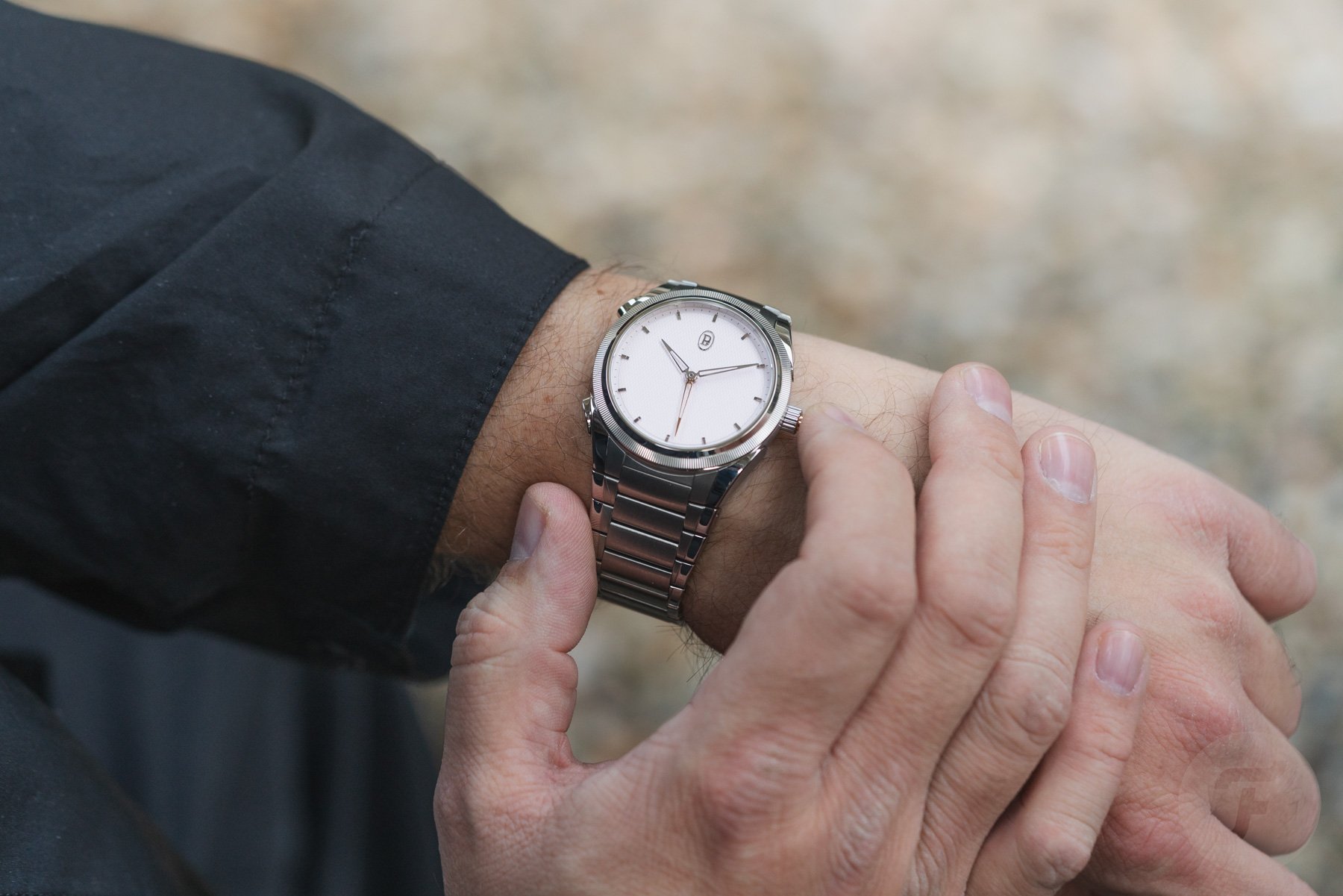 Parmigiani Fleurier Tonda PF Minute Rattrapante Arctic Rose on wrist, finger on crown pusher