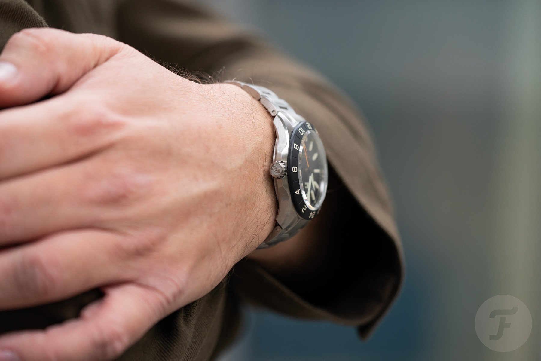 black-dial Christopher Ward C63 Sealander Extreme GMT on-wrist profile shot