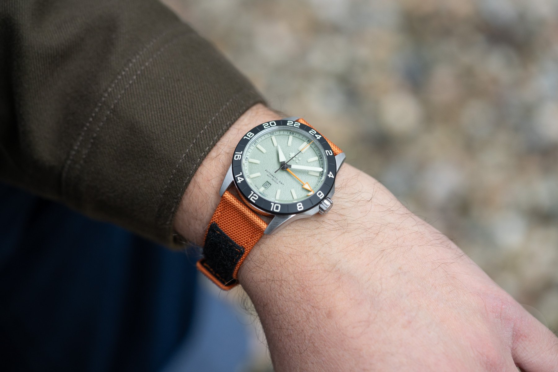 green-dial Christopher Ward C63 Sealander Extreme GMT on wrist