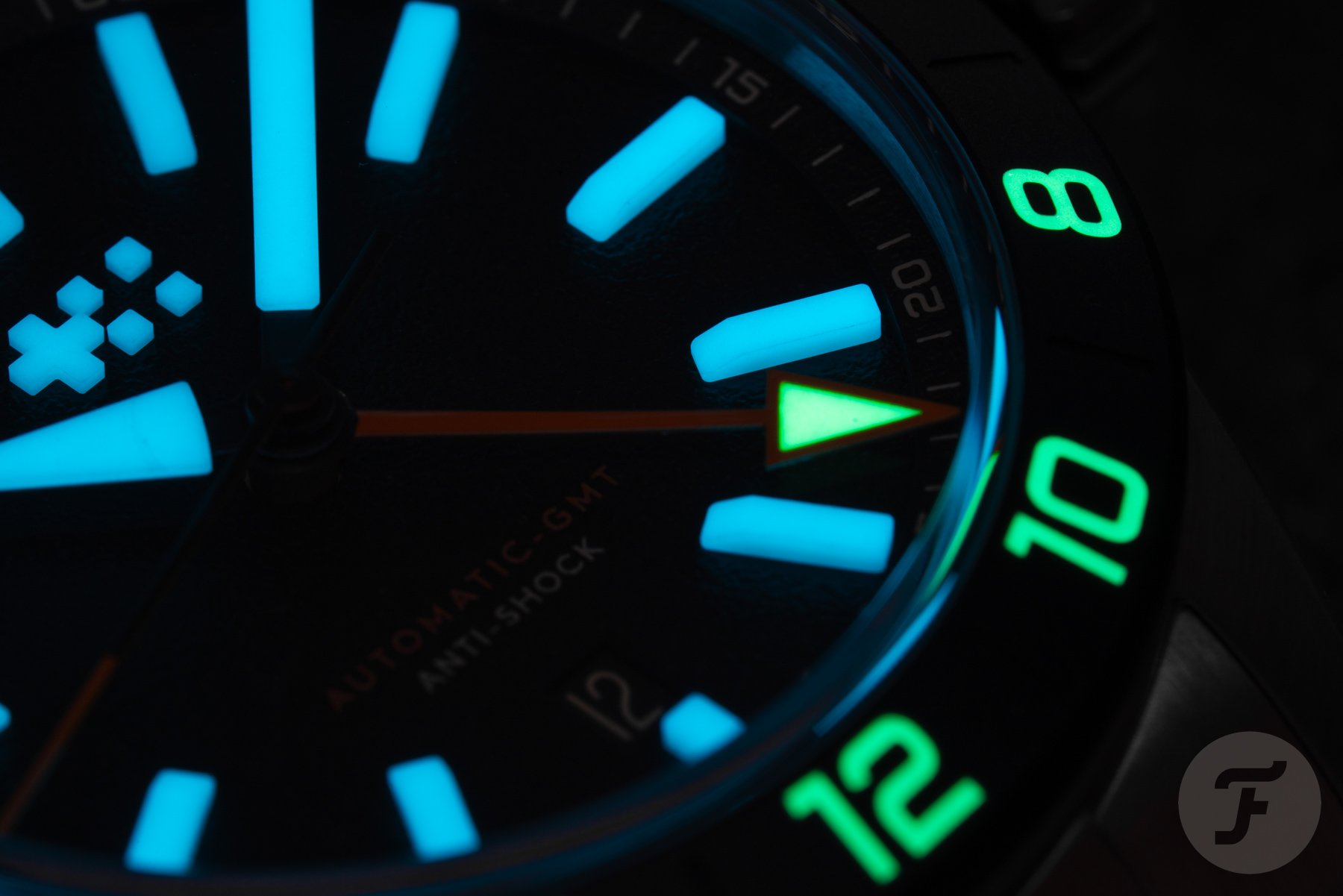 black-dial Christopher Ward C63 Sealander Extreme GMT up-close lume shot