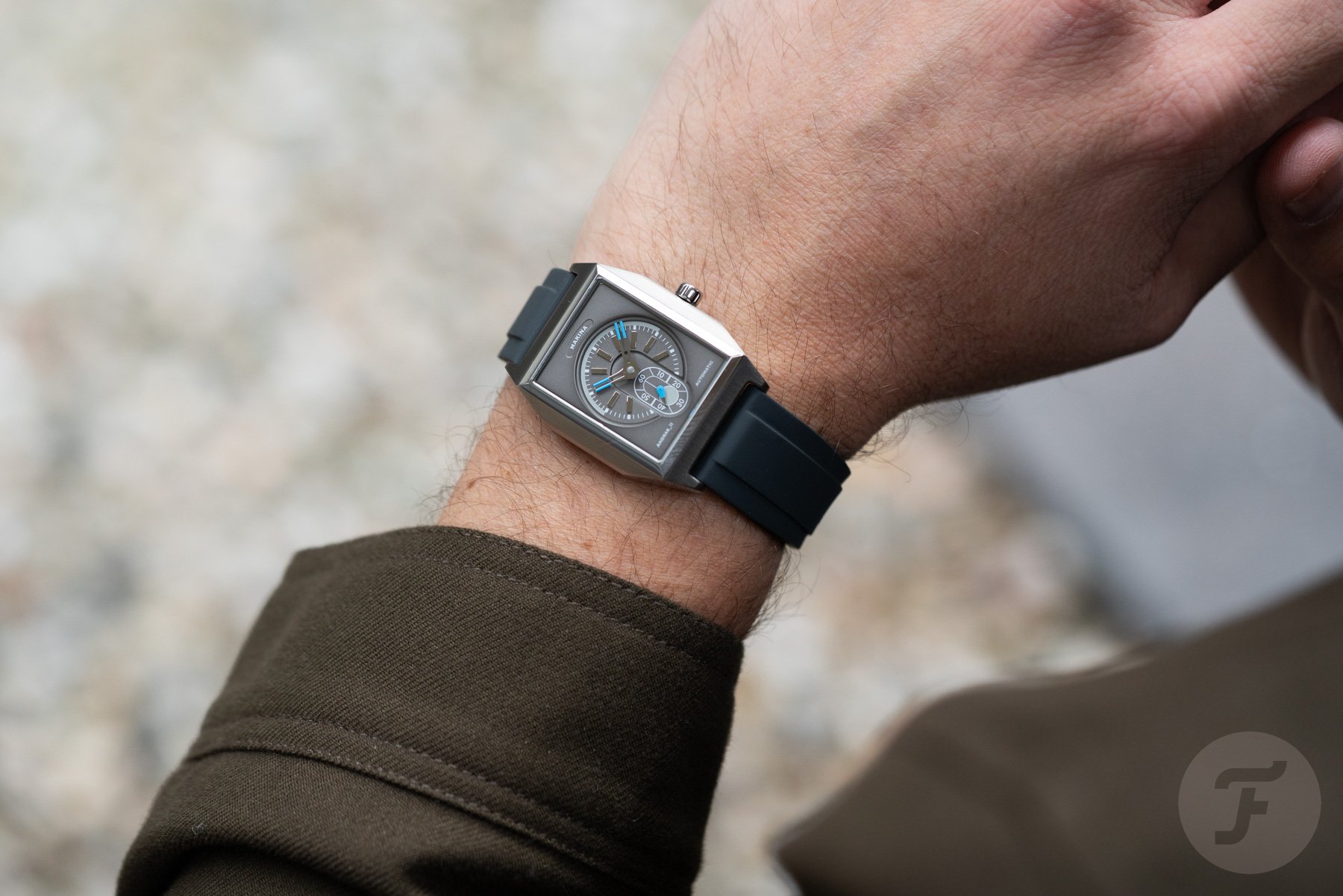 Makina Andras_II Gray on wrist, over-shoulder shot