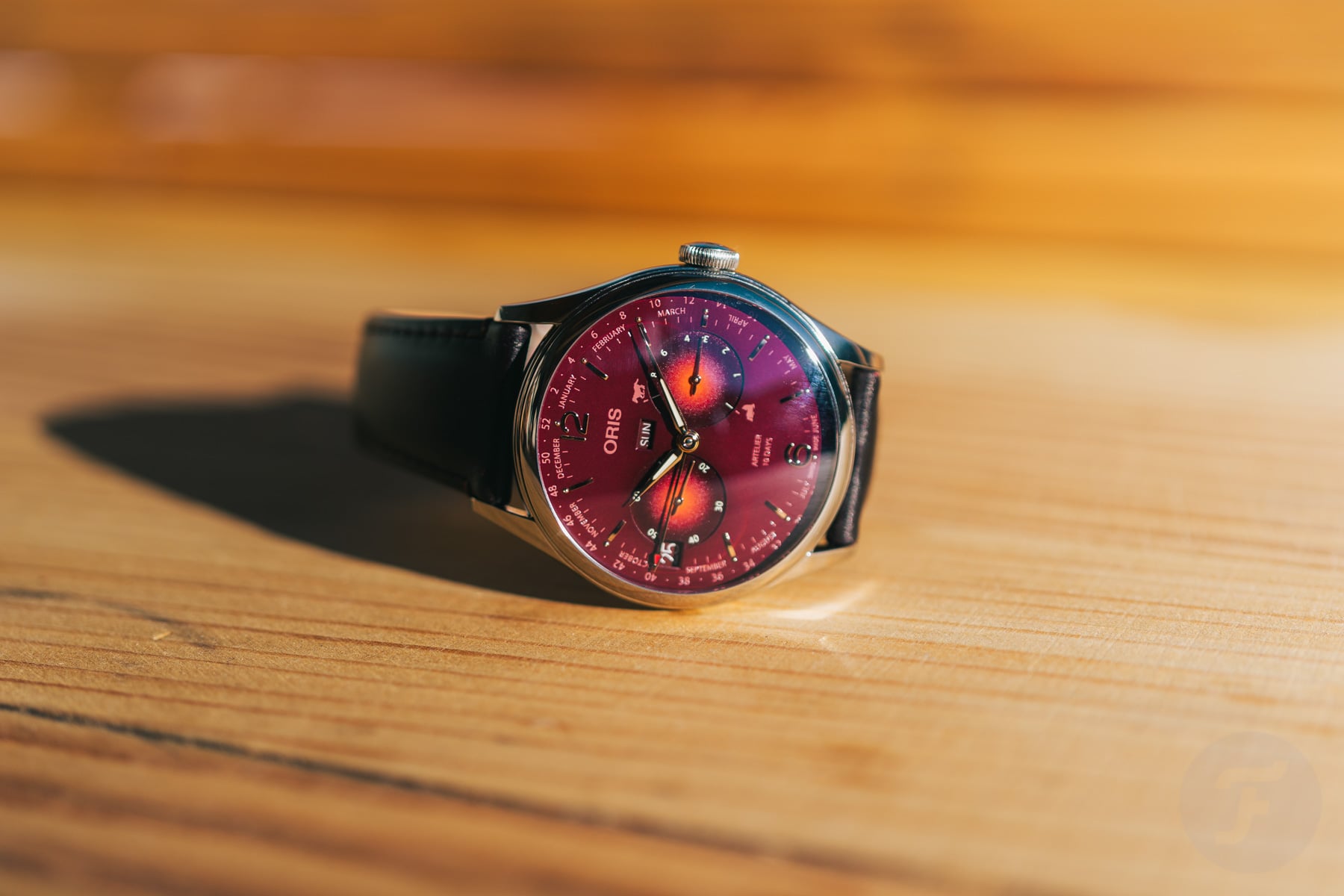 Oris Artelier Year Of The Horse Limited Edition on table, crown up