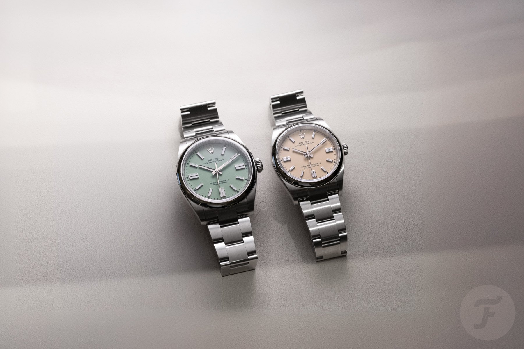 Two Rolex Oyster perpetual watches side by side