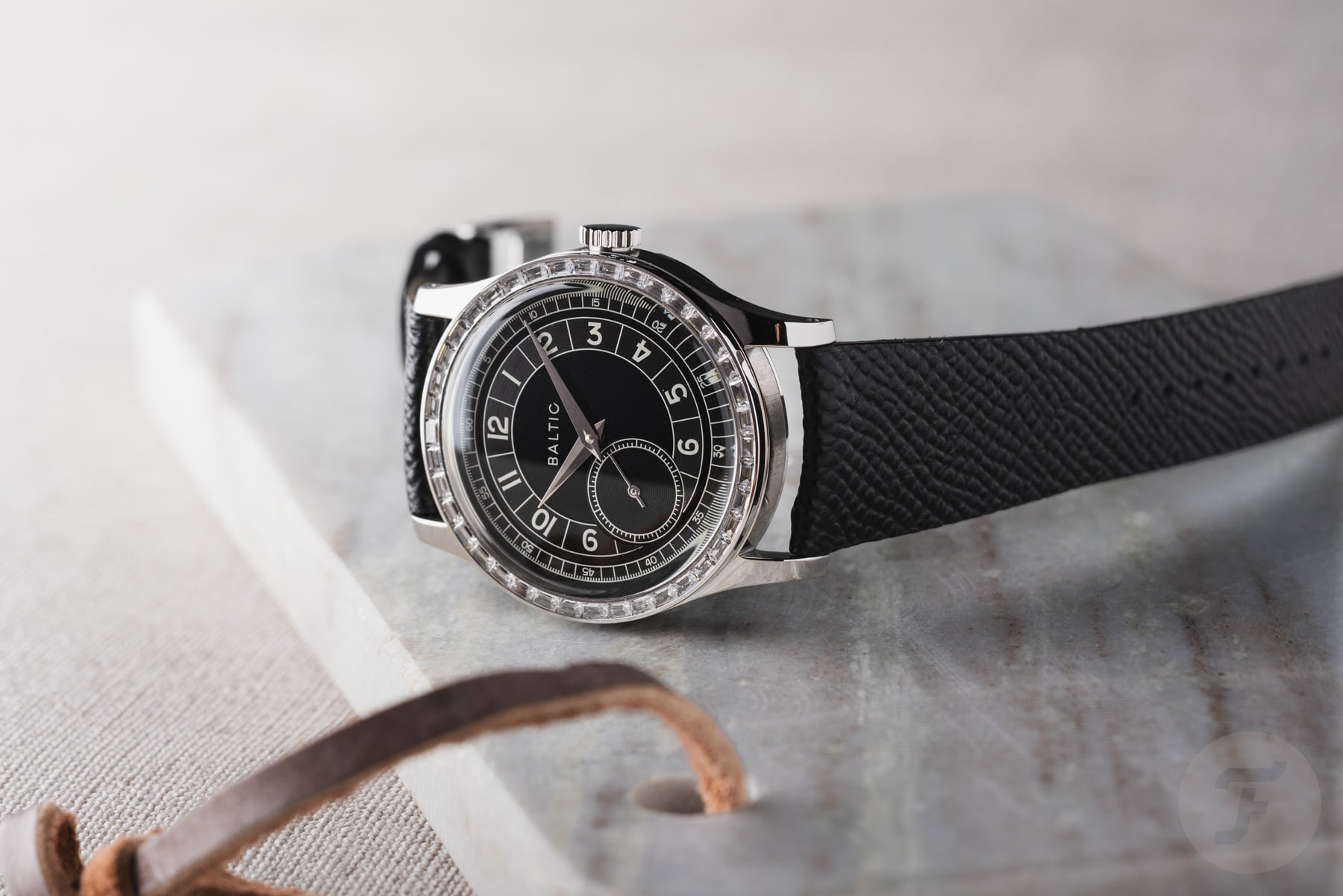 Baltic MR Moissanite Limited Edition on its side, crown up