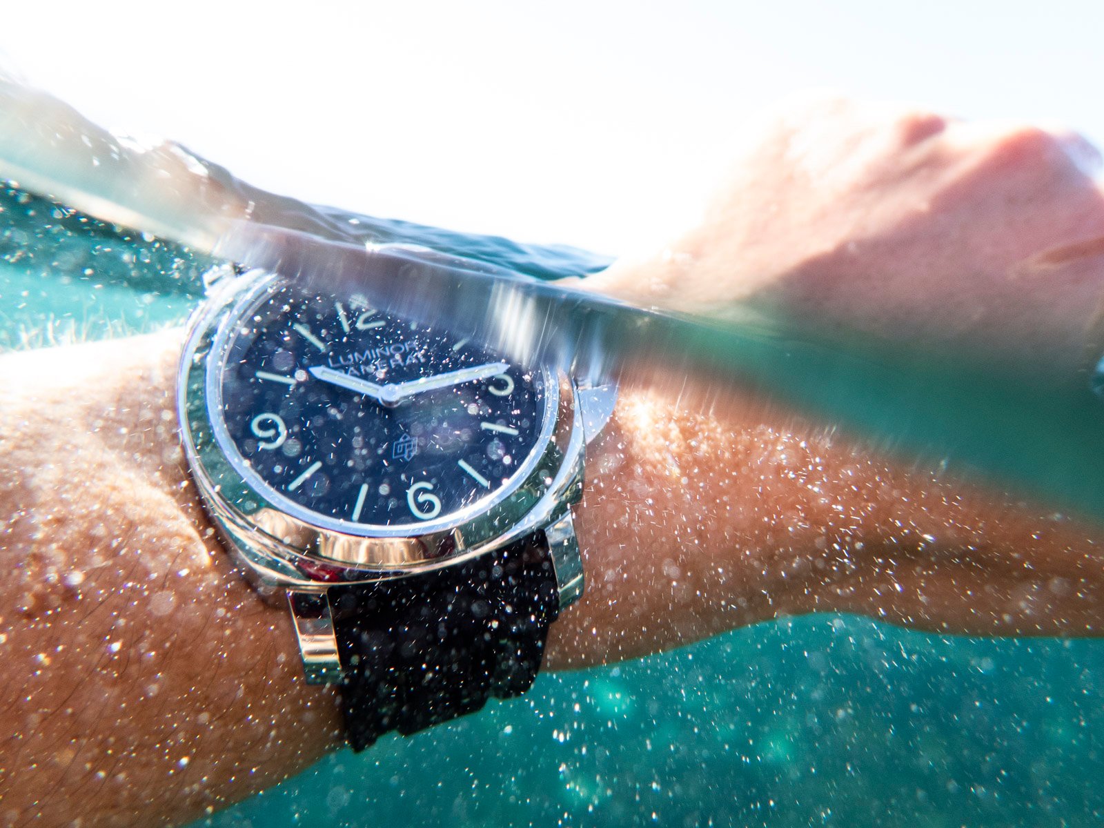 Panerai Luminor Base Logo PAM01086 on wrist, emerging from water