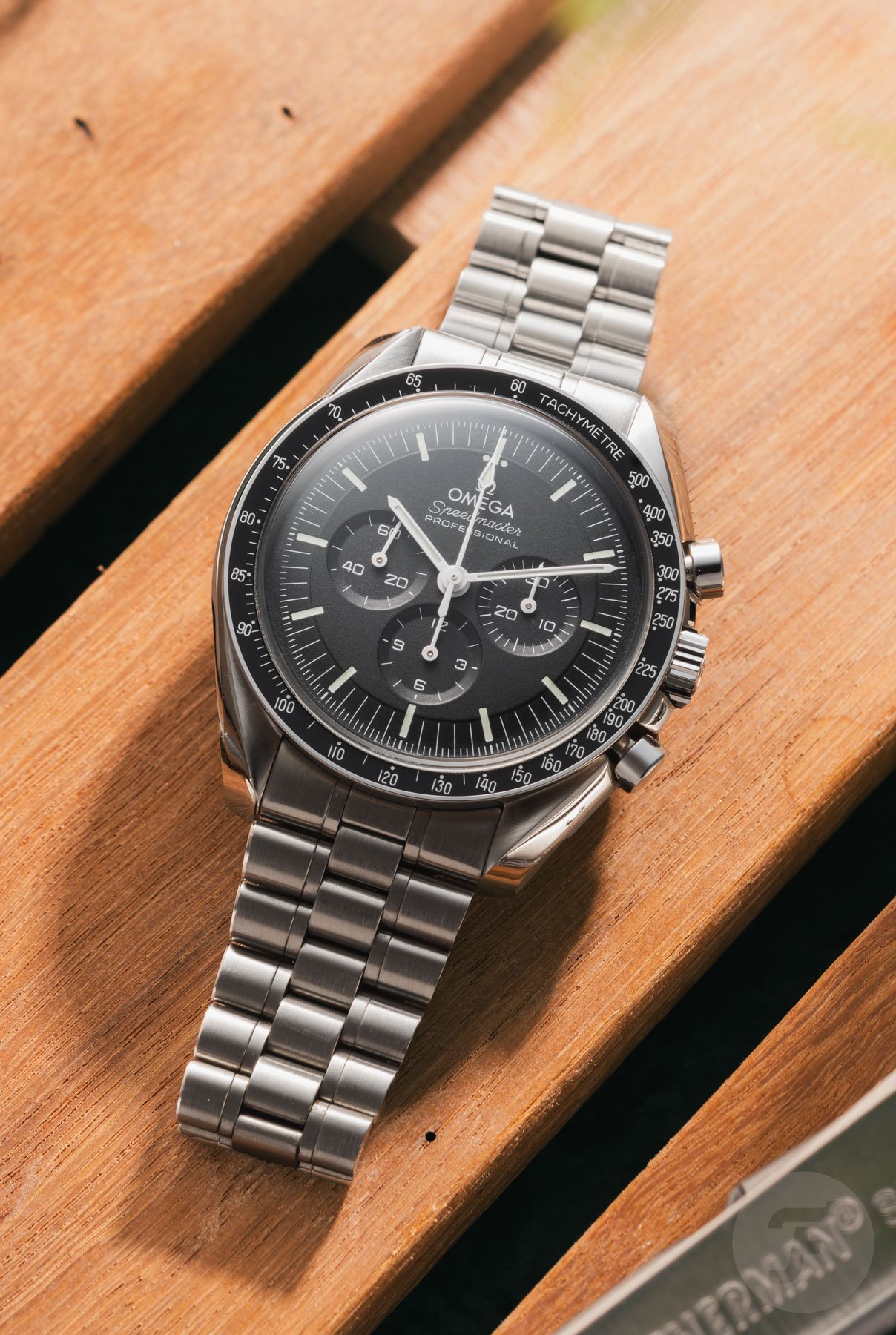 Omega Speedmaster Professional Moonwatch 310.30.42.50.01.001 flat-lay