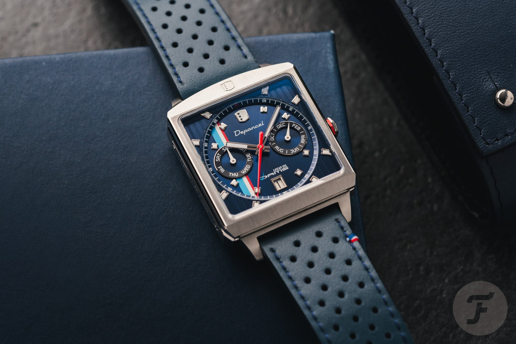 Série R01 Depancel × DAMS Lucas Oil flat-lay