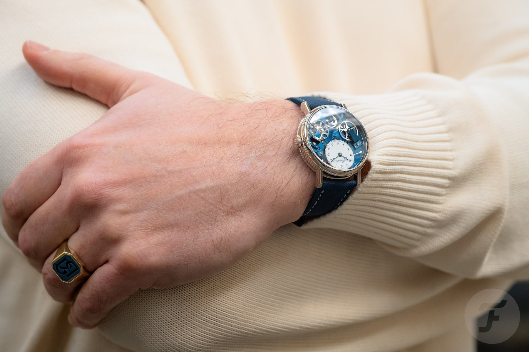 Breguet Tradition Seconde Rétrograde 7037 on wrist, arms folded