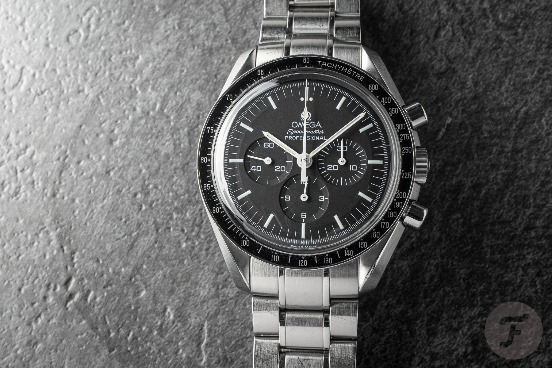 1990s Omega Speedmaster Professional ref. 3570.50.00 flat-lay, head on