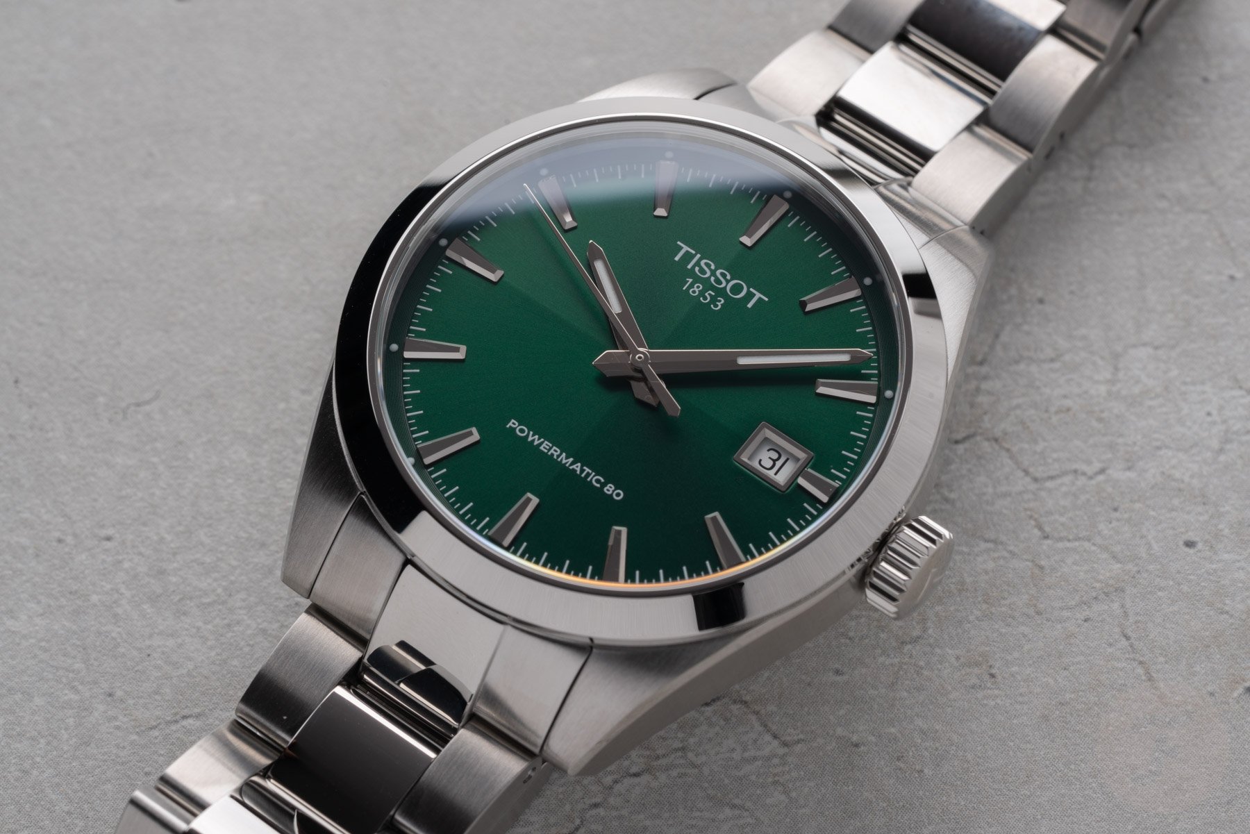 green-dial Tissot Gentleman 38mm flat-lay