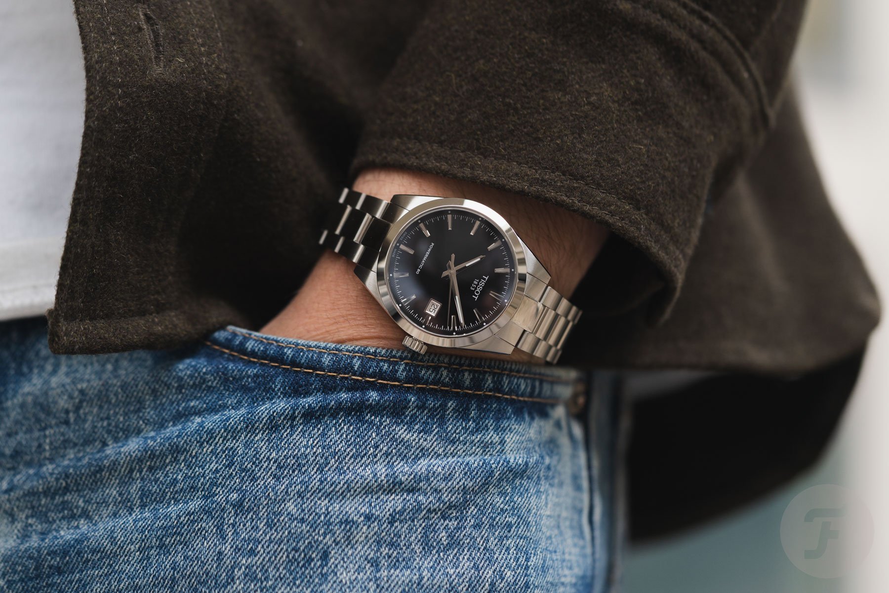 black-dial Tissot Gentleman 38mm pocket shot