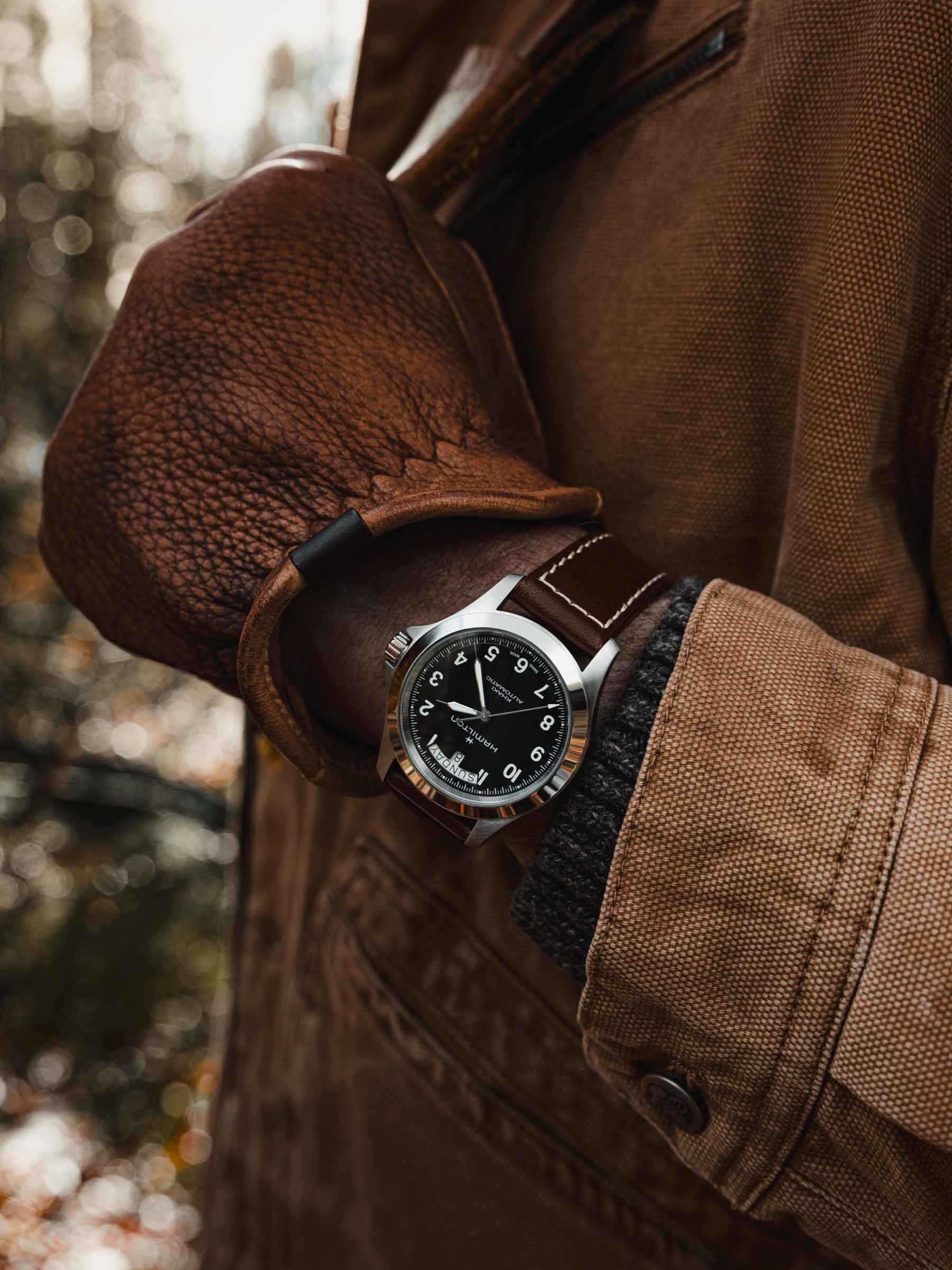 black-dial Hamilton Khaki Field King Day-Date Automatic with leather strap on wrist