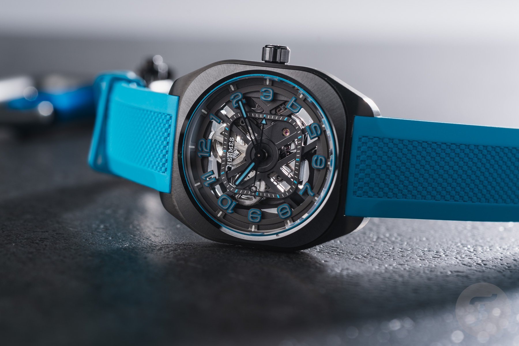 skeletonized watches — Hermès H08 Squelette on its side, crown up