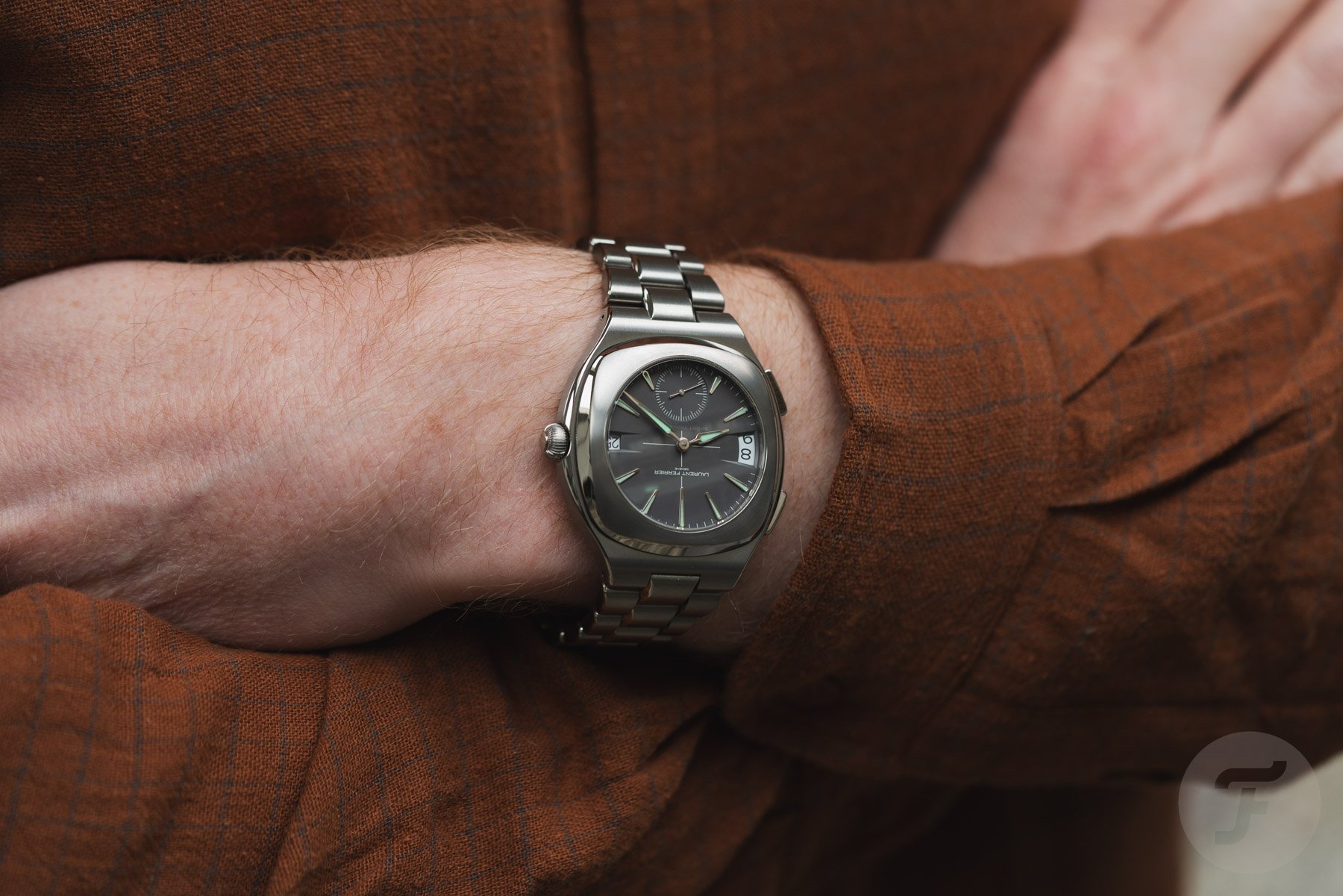 Laurent Ferrier Sport Traveller on wrist, arms crossed