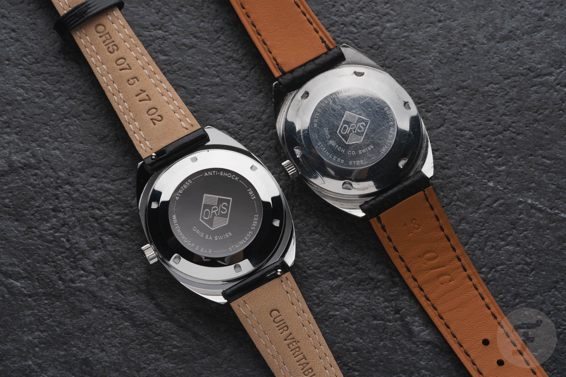 Oris Star re-edition face down next to 1960s original