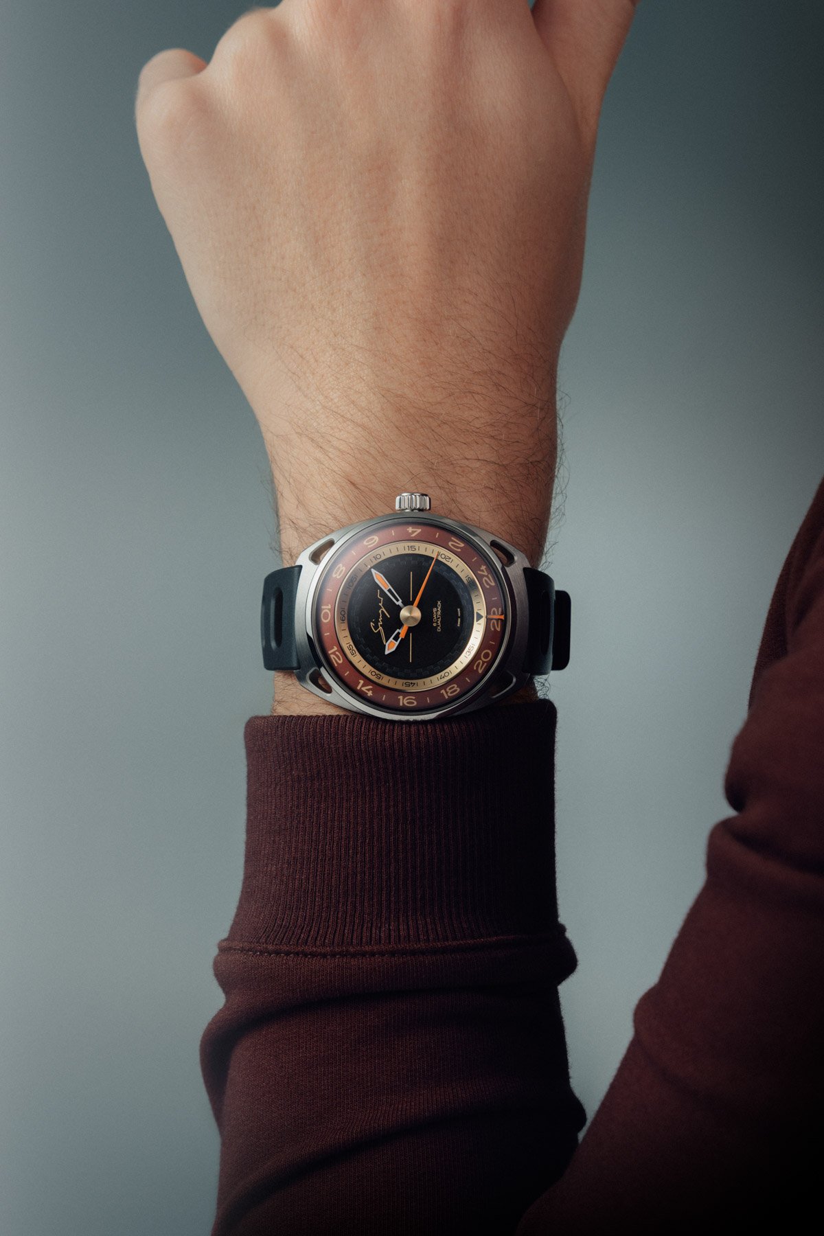 Singer Reimagined DualTrack Horizon Red on wrist