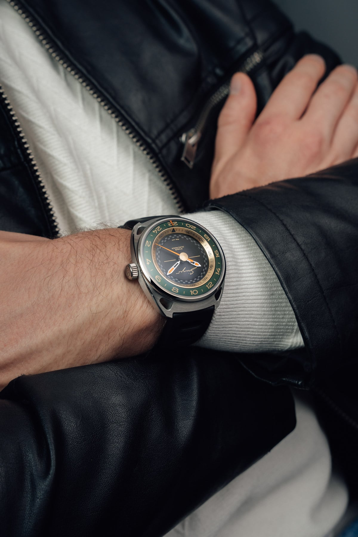 Singer Reimagined DualTrack Meridian Green on wrist, arms crossed